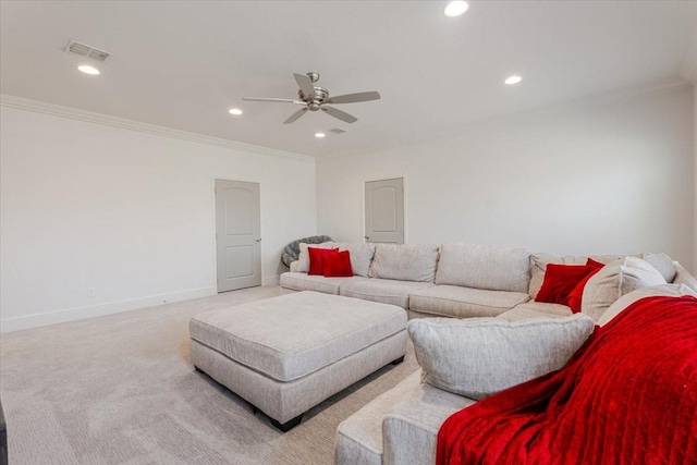 carpeted living room featuring visible vents, a ceiling fan, recessed lighting, crown molding, and baseboards