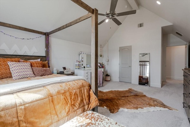 bedroom with beam ceiling, visible vents, light colored carpet, and high vaulted ceiling