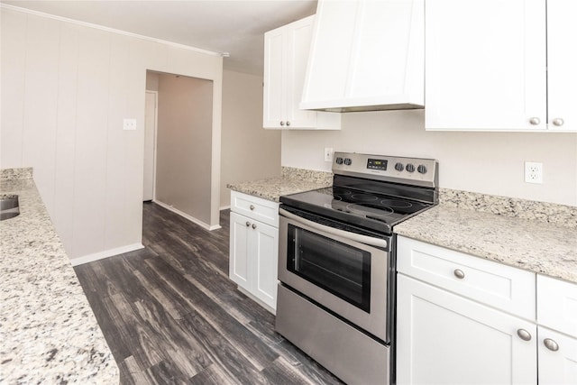 kitchen with electric range, custom exhaust hood, dark wood-style floors, and white cabinetry