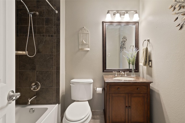 bathroom featuring shower / bathtub combination, toilet, and vanity