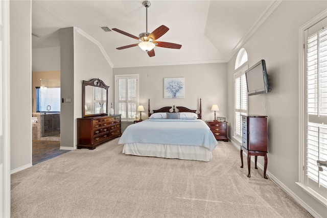 bedroom featuring baseboards, ornamental molding, carpet flooring, and vaulted ceiling