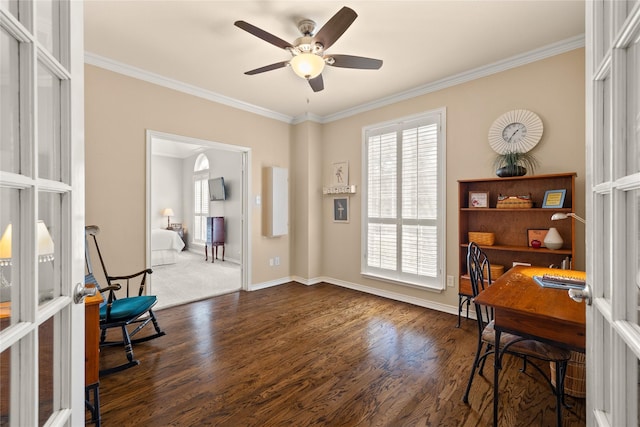 office space with baseboards, a ceiling fan, dark wood-style flooring, and ornamental molding