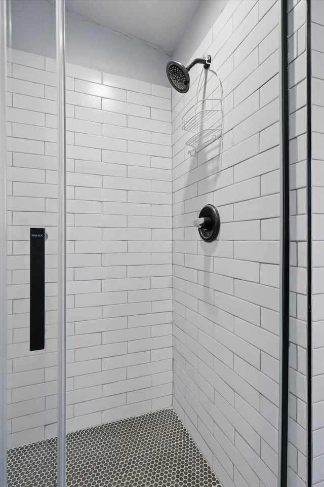 full bath featuring a stall shower