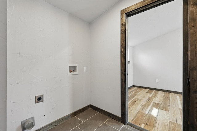 laundry area with baseboards, laundry area, hookup for a washing machine, dark wood-style floors, and hookup for an electric dryer