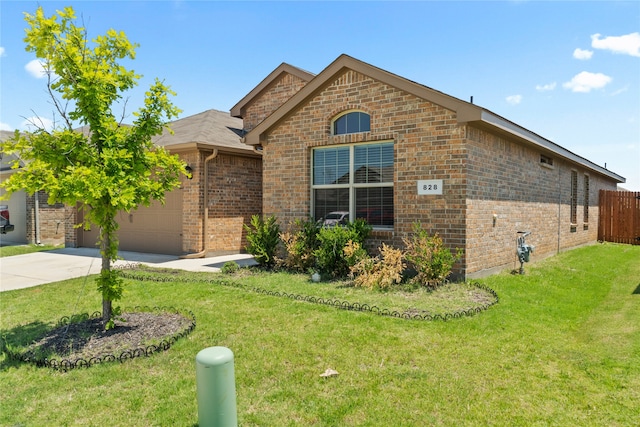 ranch-style house featuring fence, concrete driveway, a front lawn, a garage, and brick siding