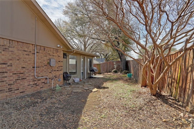 view of yard featuring a fenced backyard