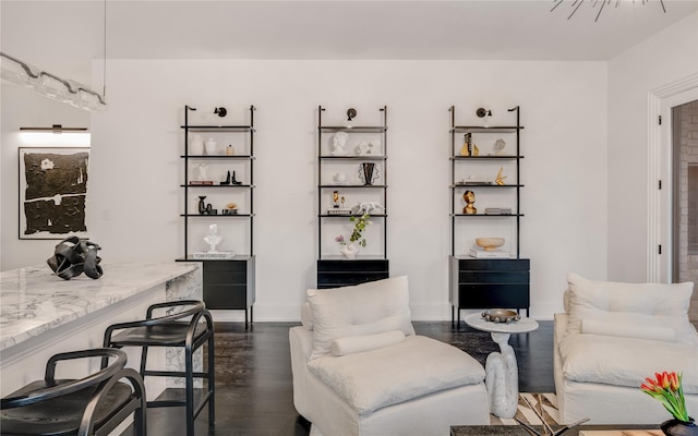 interior space with dark wood-type flooring and baseboards