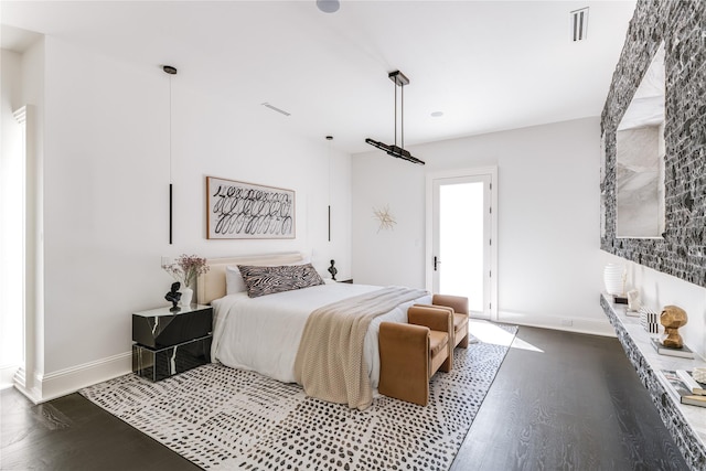 6404 Lakehurst Ave, Dallas, TX 75230 - bedroom with wood finished floors and baseboards