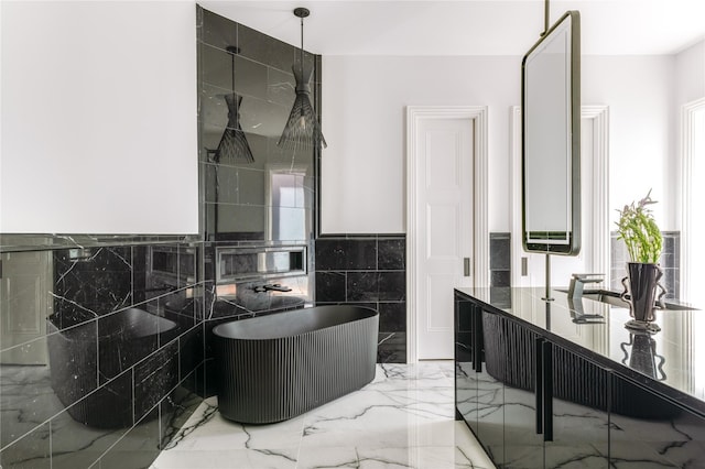 6404 Lakehurst Ave, Dallas, TX 75230 - bathroom with a soaking tub, marble tiled flooring, vanity, and tile walls