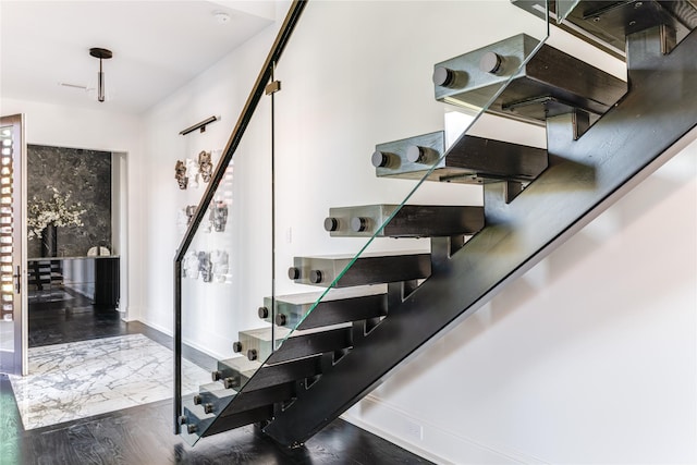 6404 Lakehurst Ave, Dallas, TX 75230 - stairs with baseboards
