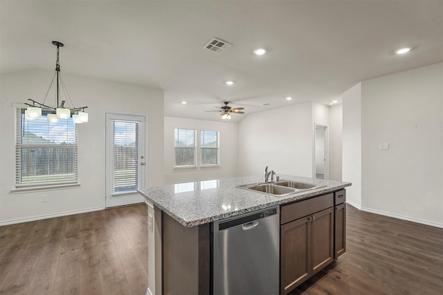 kitchen with visible vents, a sink, dark wood-type flooring, vaulted ceiling, and dishwasher