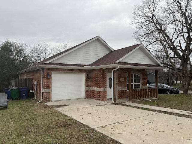 ranch-style house with brick siding, a front lawn, concrete driveway, covered porch, and a garage