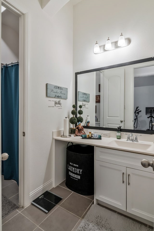 bathroom featuring vanity and tile patterned flooring