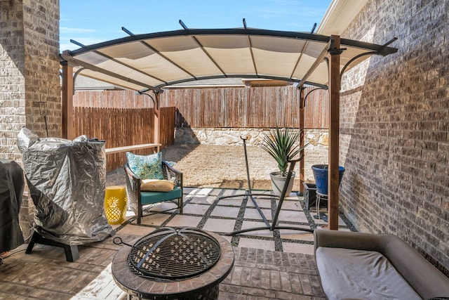 view of patio with a fenced backyard and a pergola