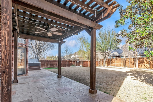 view of patio featuring a fenced backyard, a pergola, and ceiling fan