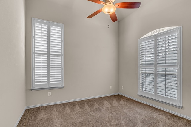 unfurnished room featuring carpet floors and ceiling fan