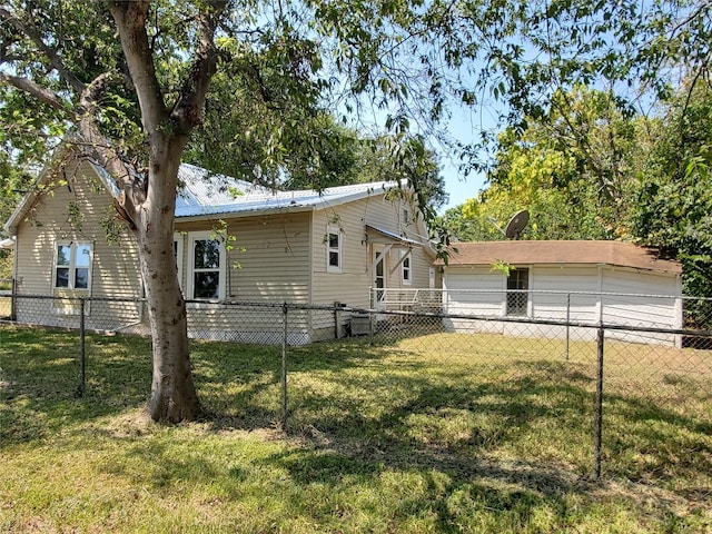 view of front of property with a front yard and fence private yard