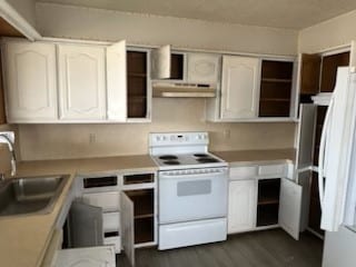 kitchen with dark wood-type flooring, a sink, white appliances, white cabinets, and light countertops