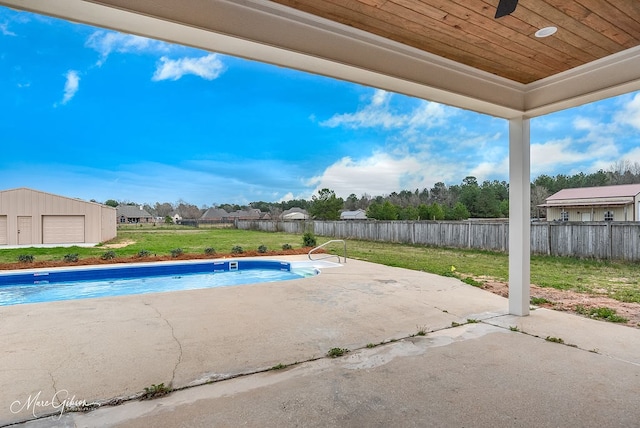 view of pool featuring a yard, a fenced in pool, a fenced backyard, and a patio area