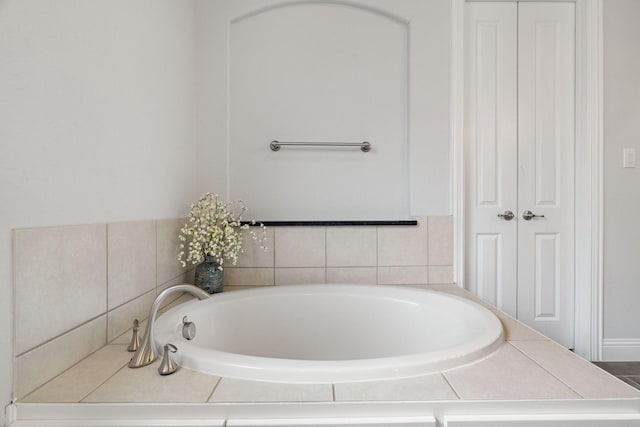 bathroom with a garden tub