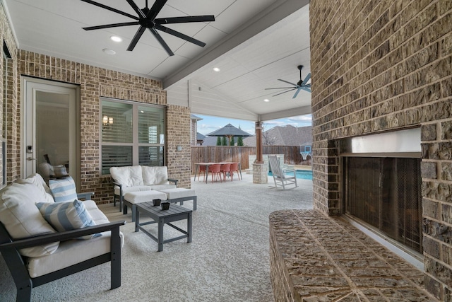 view of patio with a fenced in pool, ceiling fan, fence, an outdoor hangout area, and outdoor dining space