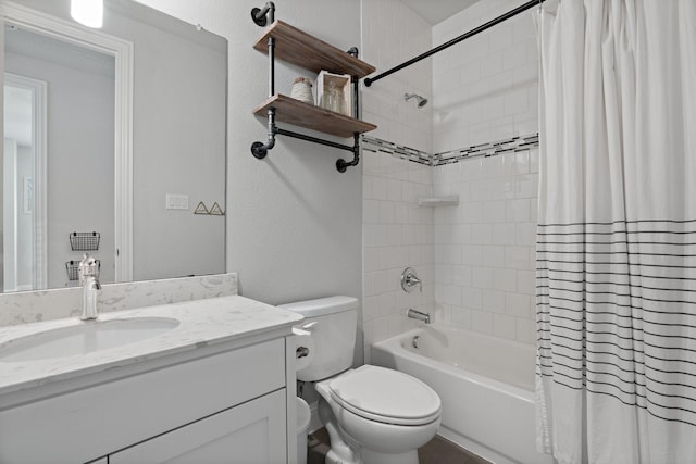 bathroom featuring toilet, shower / bath combo, and vanity