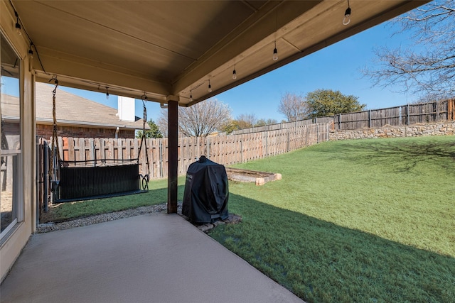 view of yard featuring a fenced backyard and a patio