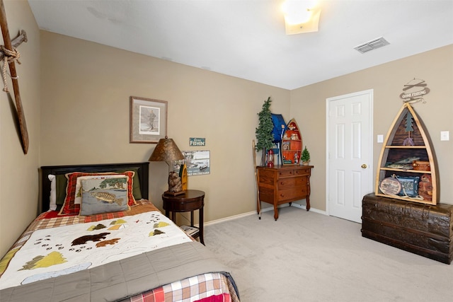 bedroom featuring visible vents, baseboards, and carpet flooring