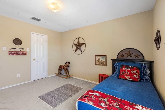 bedroom featuring visible vents, baseboards, and carpet floors