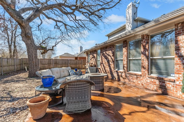 view of patio / terrace featuring central air condition unit and a fenced backyard