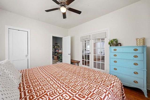 bedroom with dark wood-type flooring and a ceiling fan