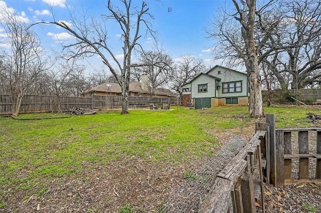 view of yard with fence