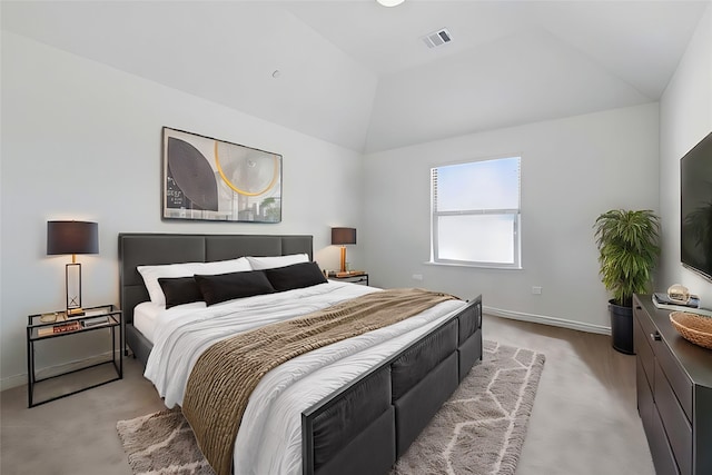 bedroom with vaulted ceiling, baseboards, visible vents, and light carpet