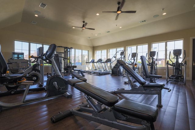 workout area with visible vents, ceiling fan, and wood finished floors