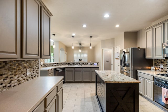 1513 Hidden Cove Ct, Allen, TX 75002 - kitchen with appliances with stainless steel finishes, gray cabinetry, a sink, tasteful backsplash, and recessed lighting