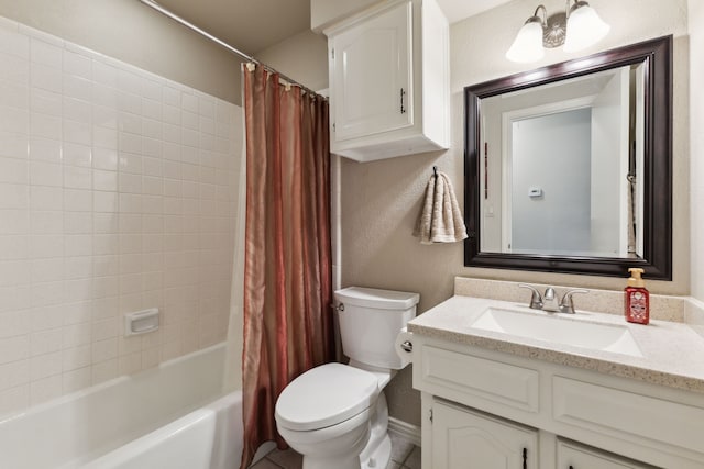 bathroom with vanity, toilet, a textured wall, and shower / bath combo with shower curtain