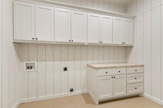 washroom with cabinet space, electric dryer hookup, and washer hookup