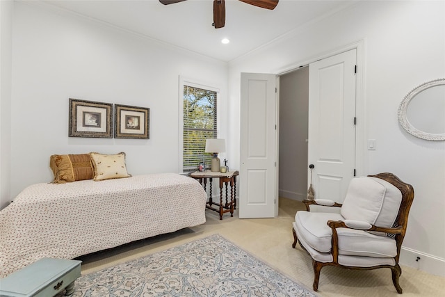 carpeted bedroom featuring a ceiling fan, crown molding, recessed lighting, and baseboards