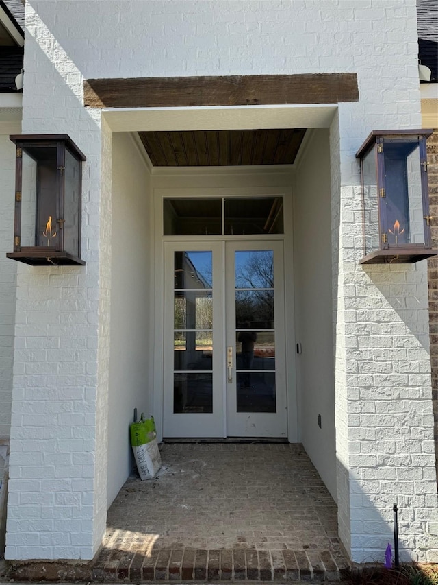 entrance to property featuring french doors