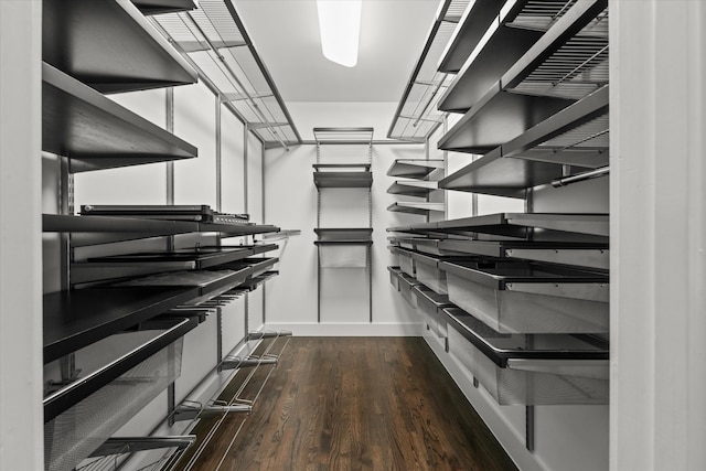 spacious closet with wood finished floors