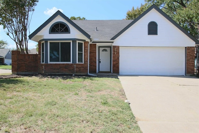 single story home featuring a front lawn, brick siding, concrete driveway, and an attached garage