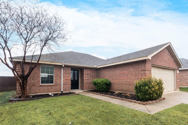 ranch-style home featuring driveway, a front lawn, roof with shingles, a garage, and brick siding