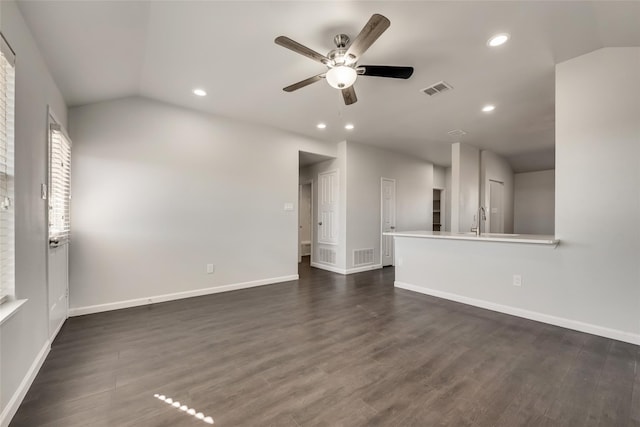 unfurnished living room featuring recessed lighting, visible vents, and a sink