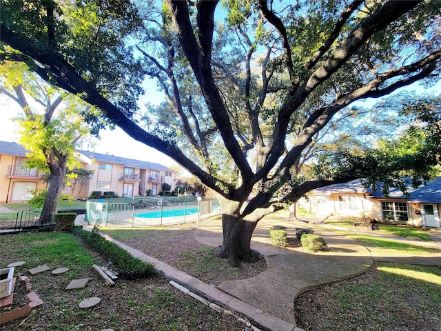 view of yard with an outdoor pool