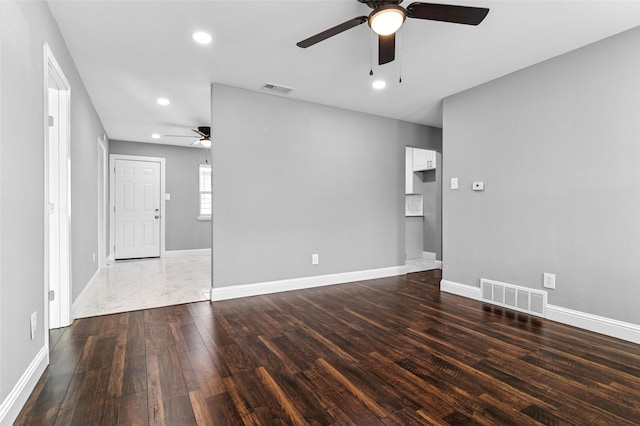 unfurnished room featuring visible vents, recessed lighting, a ceiling fan, and wood finished floors