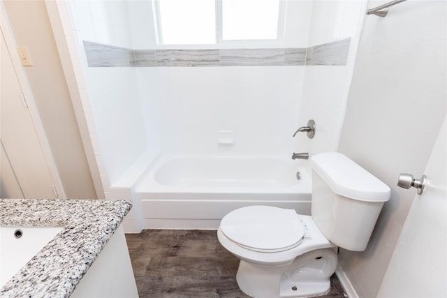 full bath featuring vanity, toilet, wood finished floors, and shower / bathtub combination