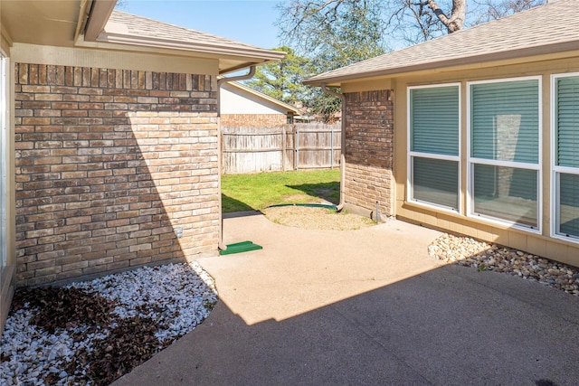 view of patio with fence