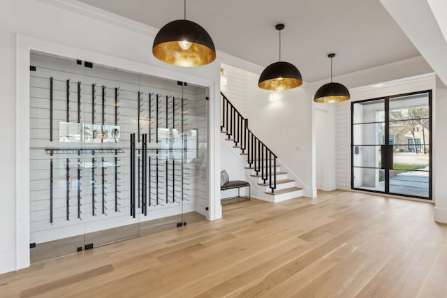 interior space with wood finished floors and stairs