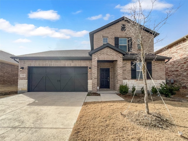 view of front of home featuring brick siding, concrete driveway, a garage, and a shingled roof