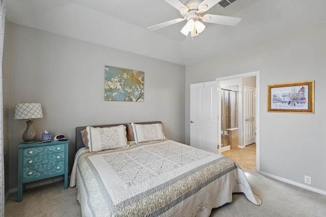 bedroom featuring connected bathroom, ceiling fan, baseboards, vaulted ceiling, and carpet floors